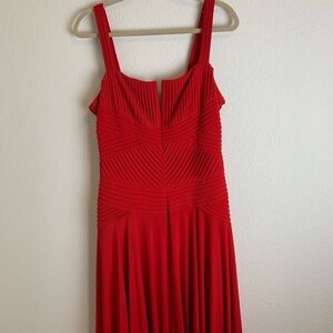 Calvin Klein: Elegant Red Pleated Dress